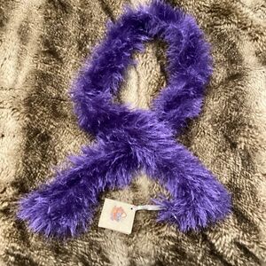 Purple scarf hand knit with “fun fir” yarn - approx 50 inches long